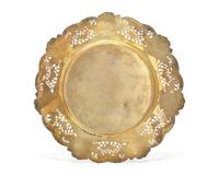 A Set Of Fourteen Gilt Sterling Silver Floral Cast And Reticulated Dinner Plates