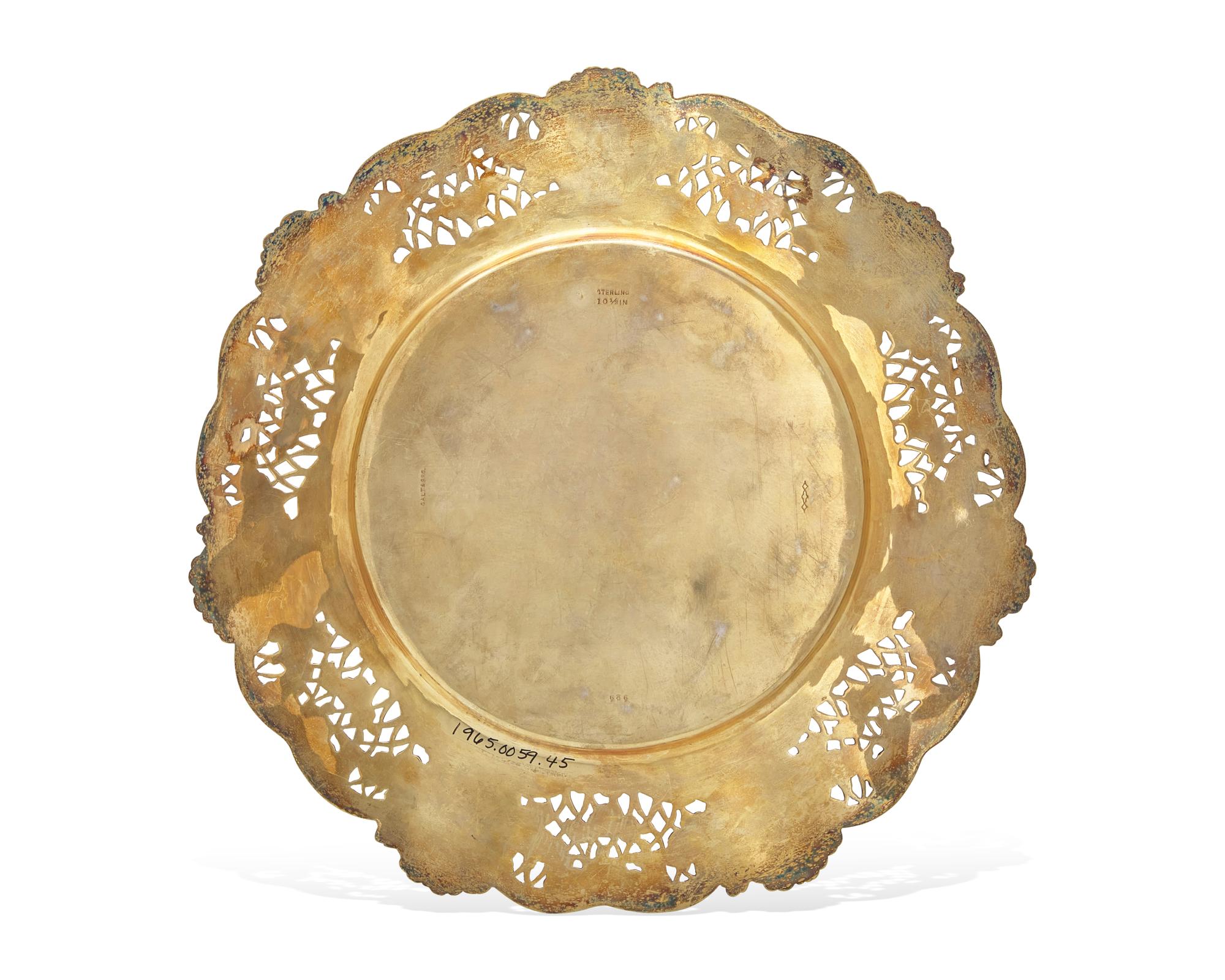 A Set Of Fourteen Gilt Sterling Silver Floral Cast And Reticulated Dinner Plates