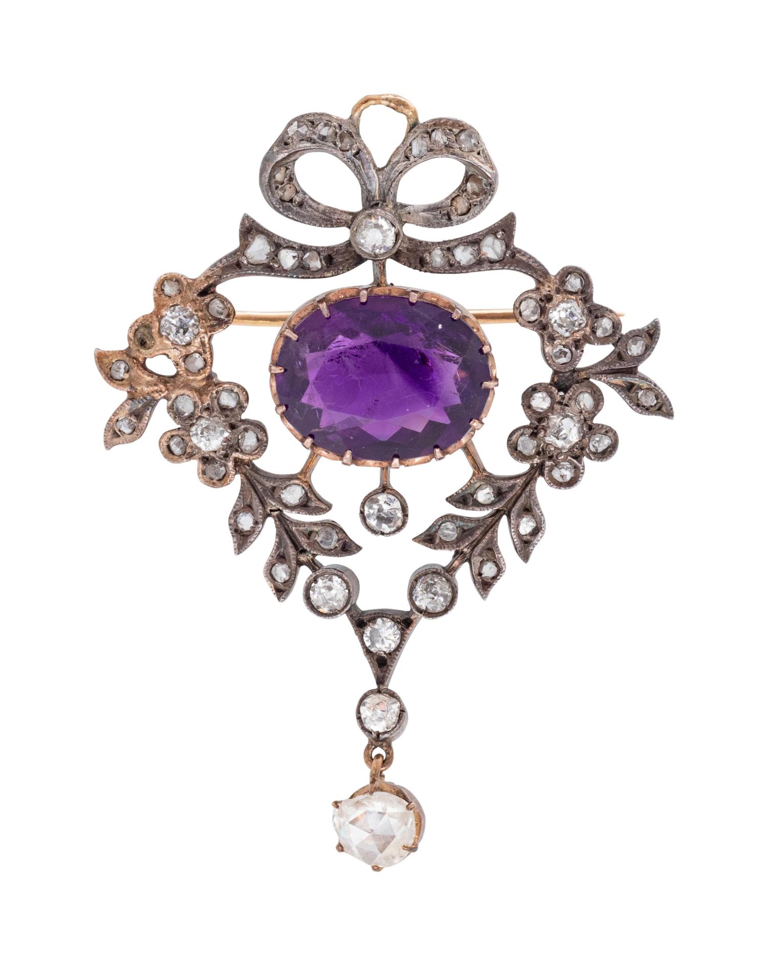 A Silver Topped Gold, Amethyst and Diamond Pendant/Brooch,