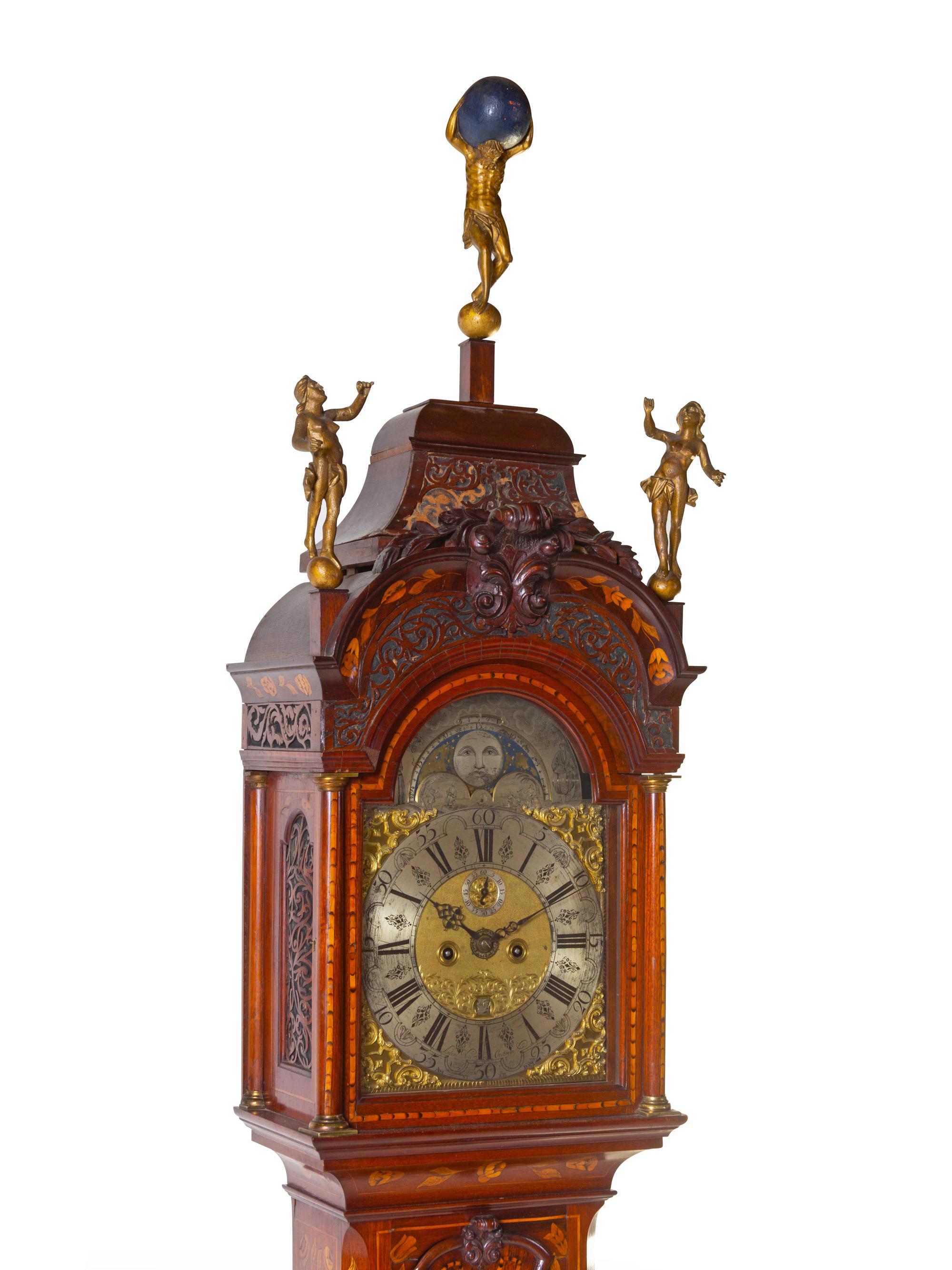 A Dutch Walnut and Marquetry Tall Case Clock