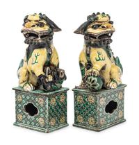 A Pair of Chinese Famille Verte Porcelain Figures of Fu Lions