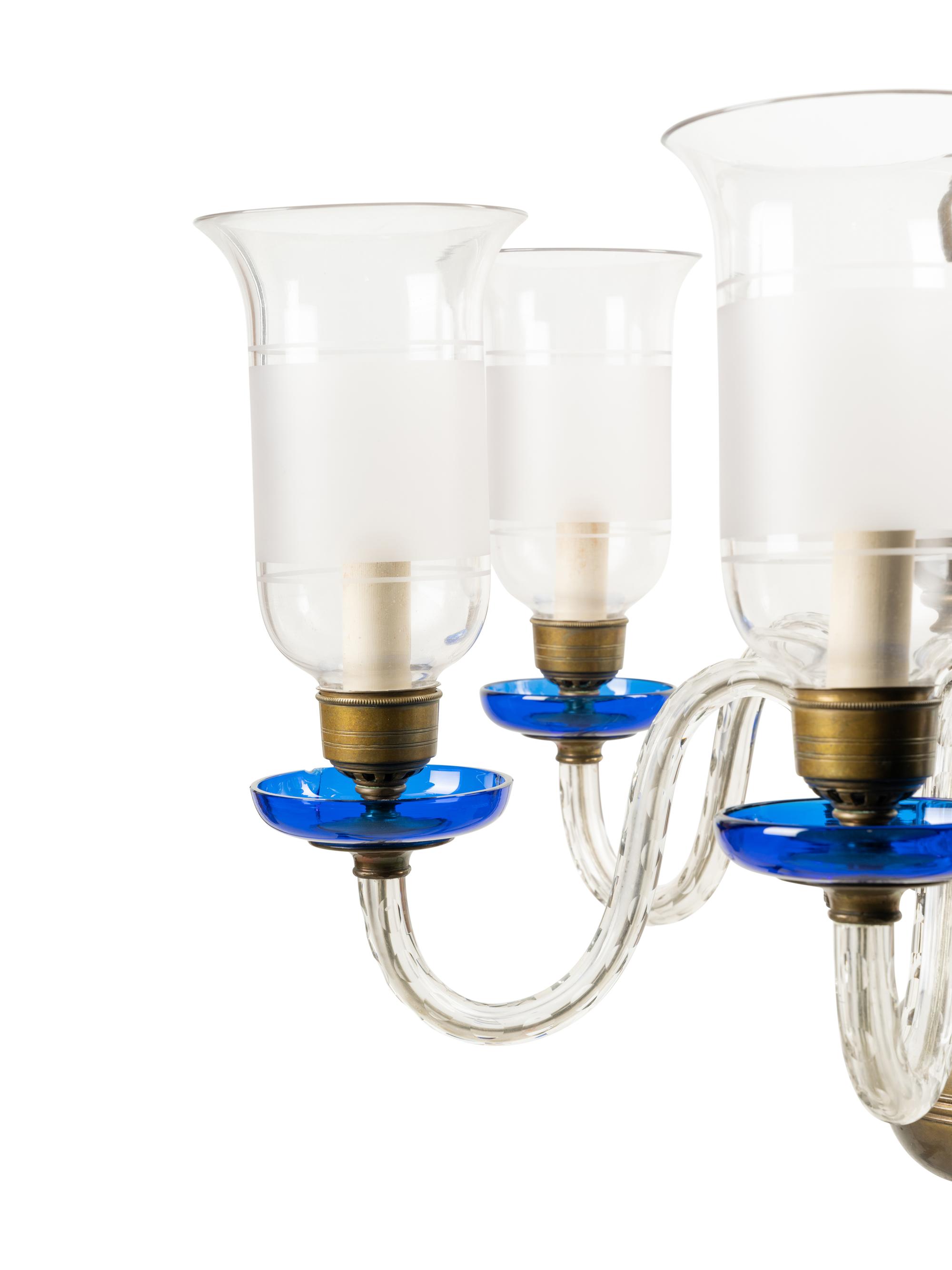 A Baroque Style Brass and Glass Six-Light Chandelier