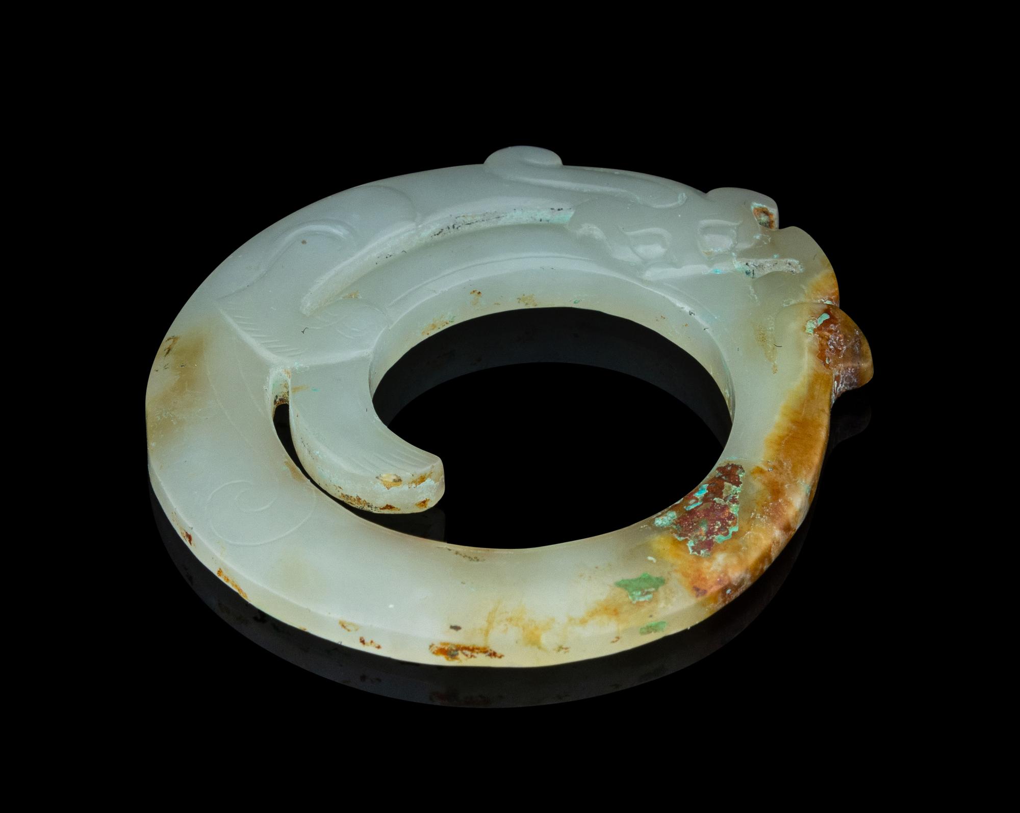 A Carved Jade 'Chilong' Bi Disc