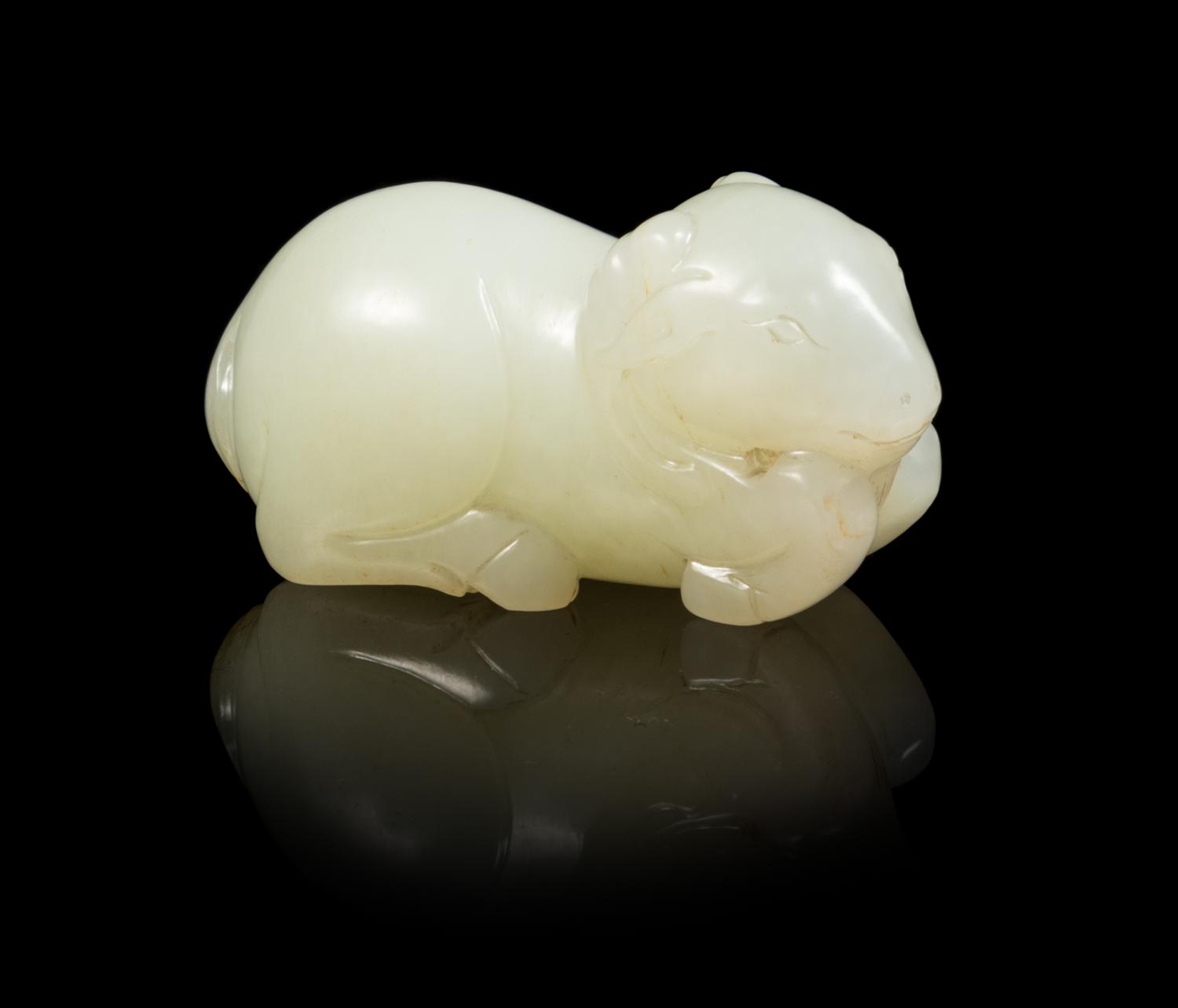 A Pale Celadon Jade Figure of a Ram Length 2 1/2 inches. — 19TH CENTURY