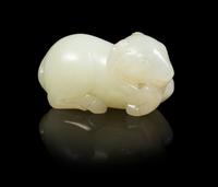 A Pale Celadon Jade Figure of a Ram Length 2 1/2 inches. — 19TH CENTURY