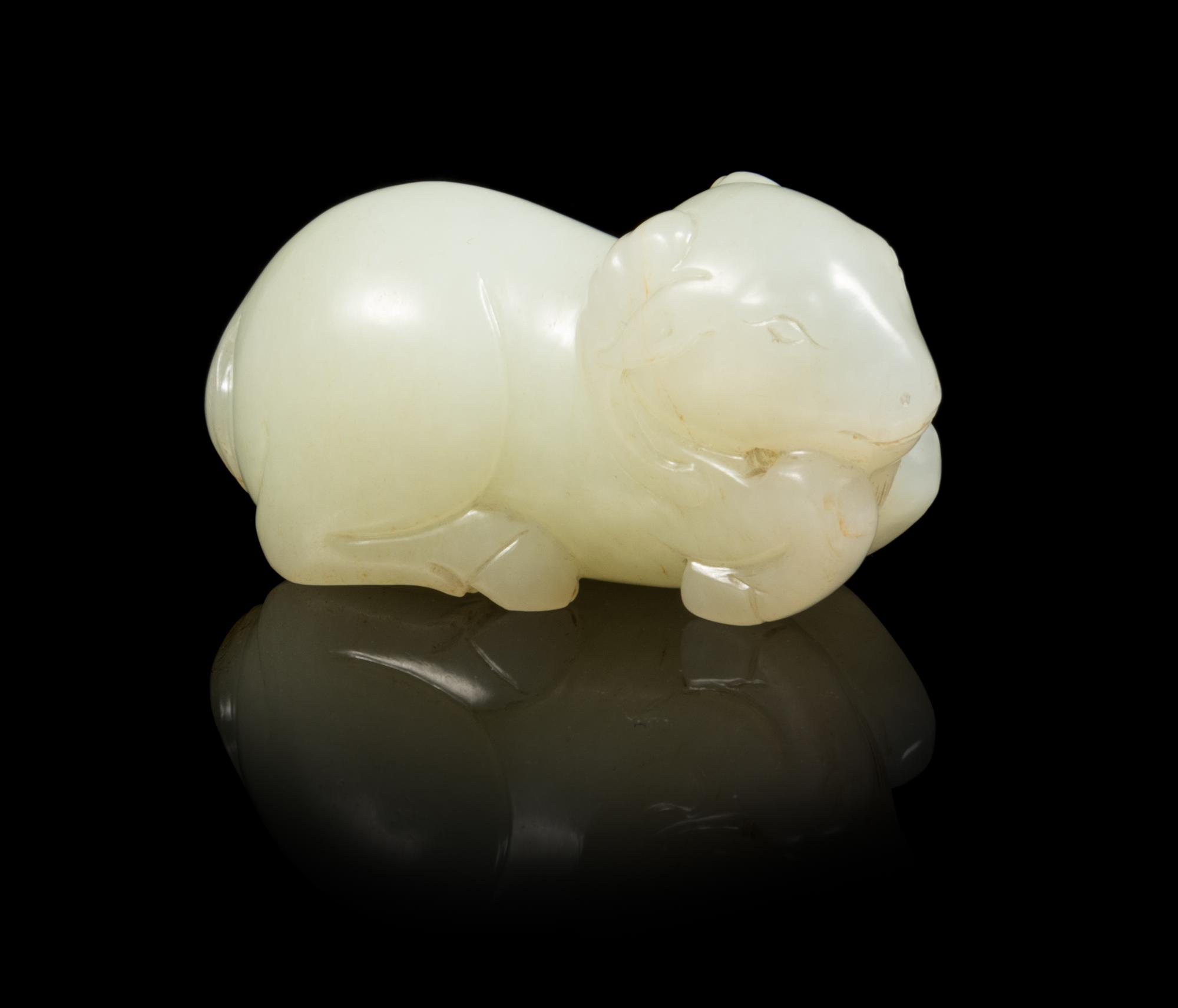 A Pale Celadon Jade Figure of a Ram Length 2 1/2 inches. — 19TH CENTURY