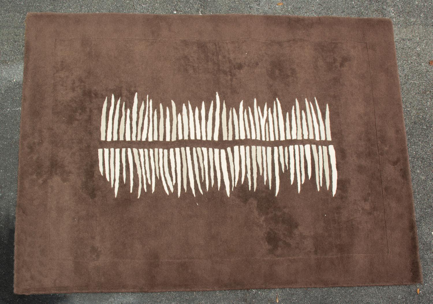 A Contemporary Brown Wool Rug — 20TH CENTURY