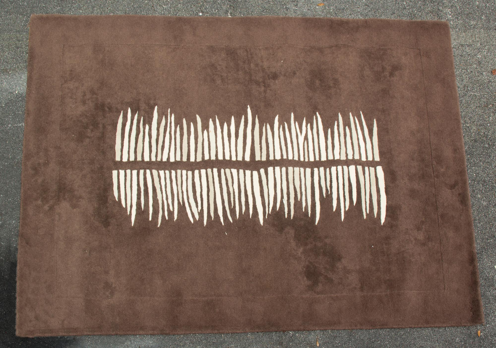 A Contemporary Brown Wool Rug — 20TH CENTURY