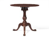 A George III carved mahogany tilt-top tea table, 18th / 19th century