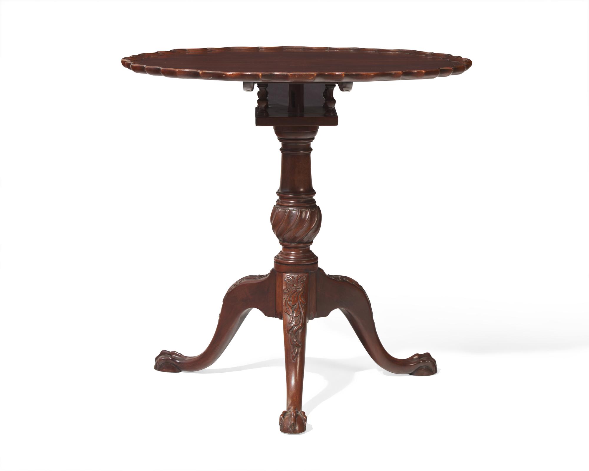 A George III carved mahogany tilt-top tea table, 18th / 19th century