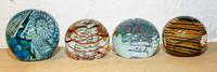 Four Glass Paperweights Height of tallest 4 3/4 inches. — 20TH CENTURY