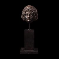 A Roman Silver Head and Two Roman Bronze Coins