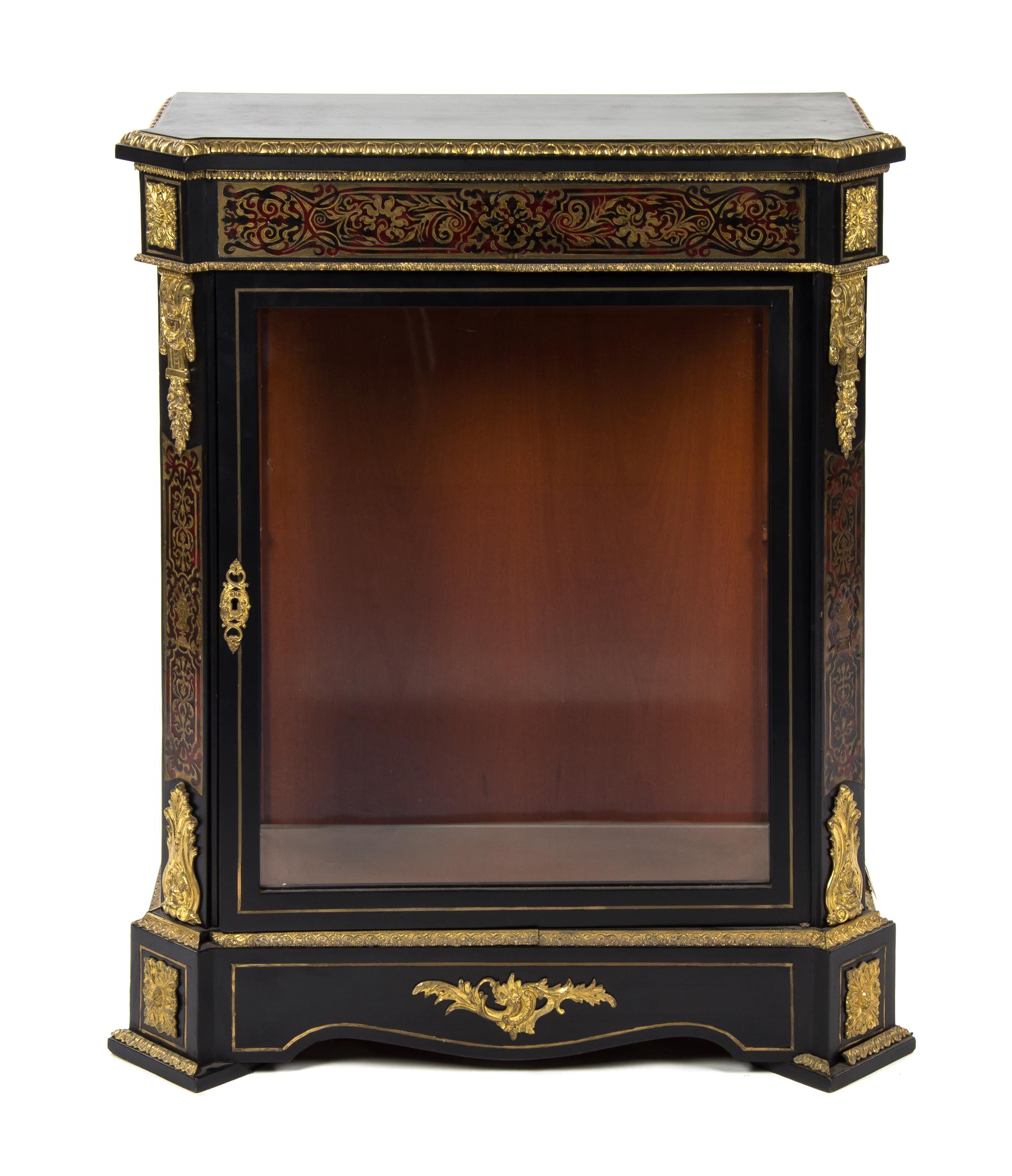 A Napoleon III Gilt Bronze Mounted Ebonized Vitrine, Height 39 1/2 x width 32 1/2 x depth 14 3/4 inches.