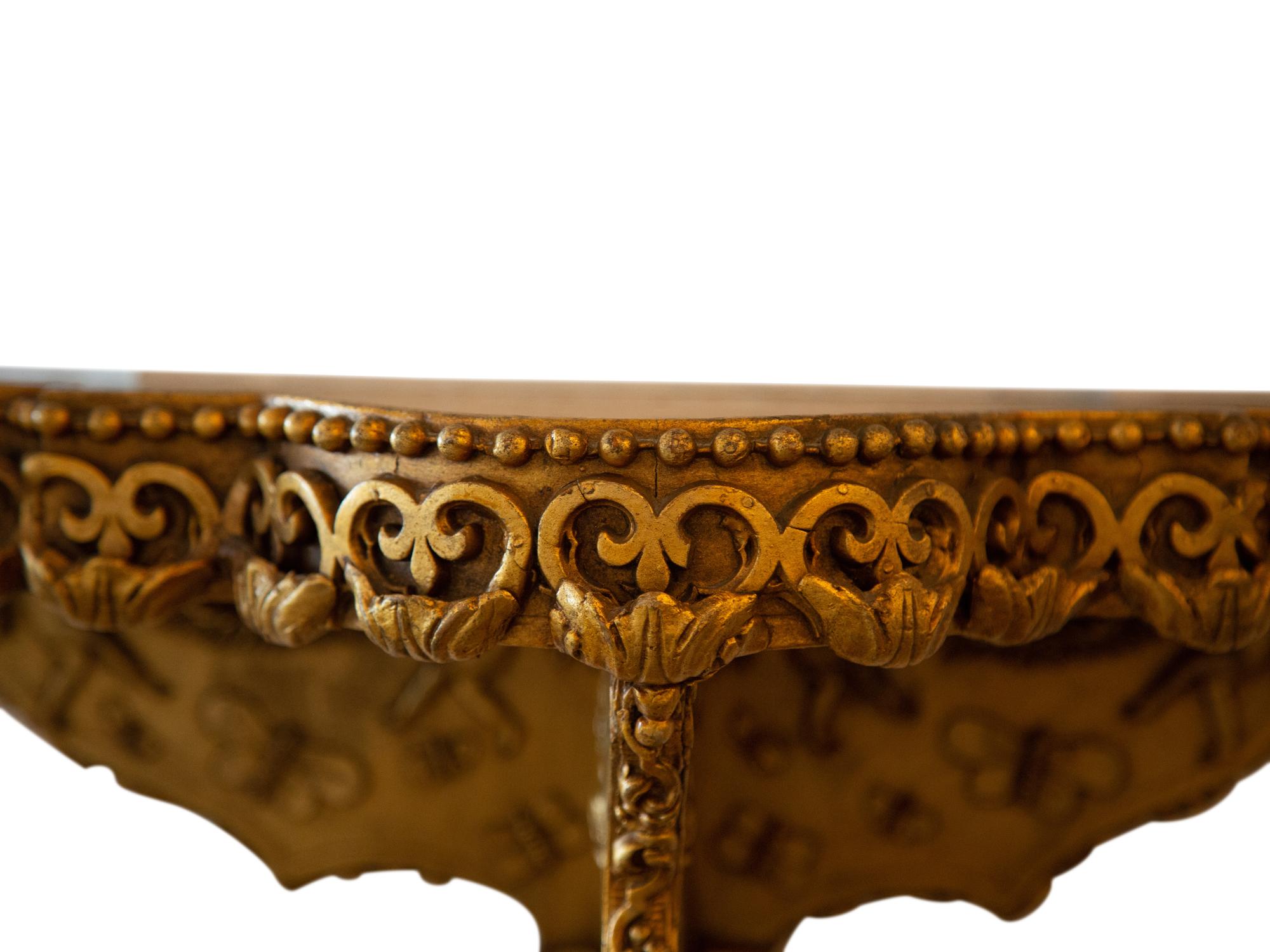 A Rococo Style Carved Giltwood Wall Bracket