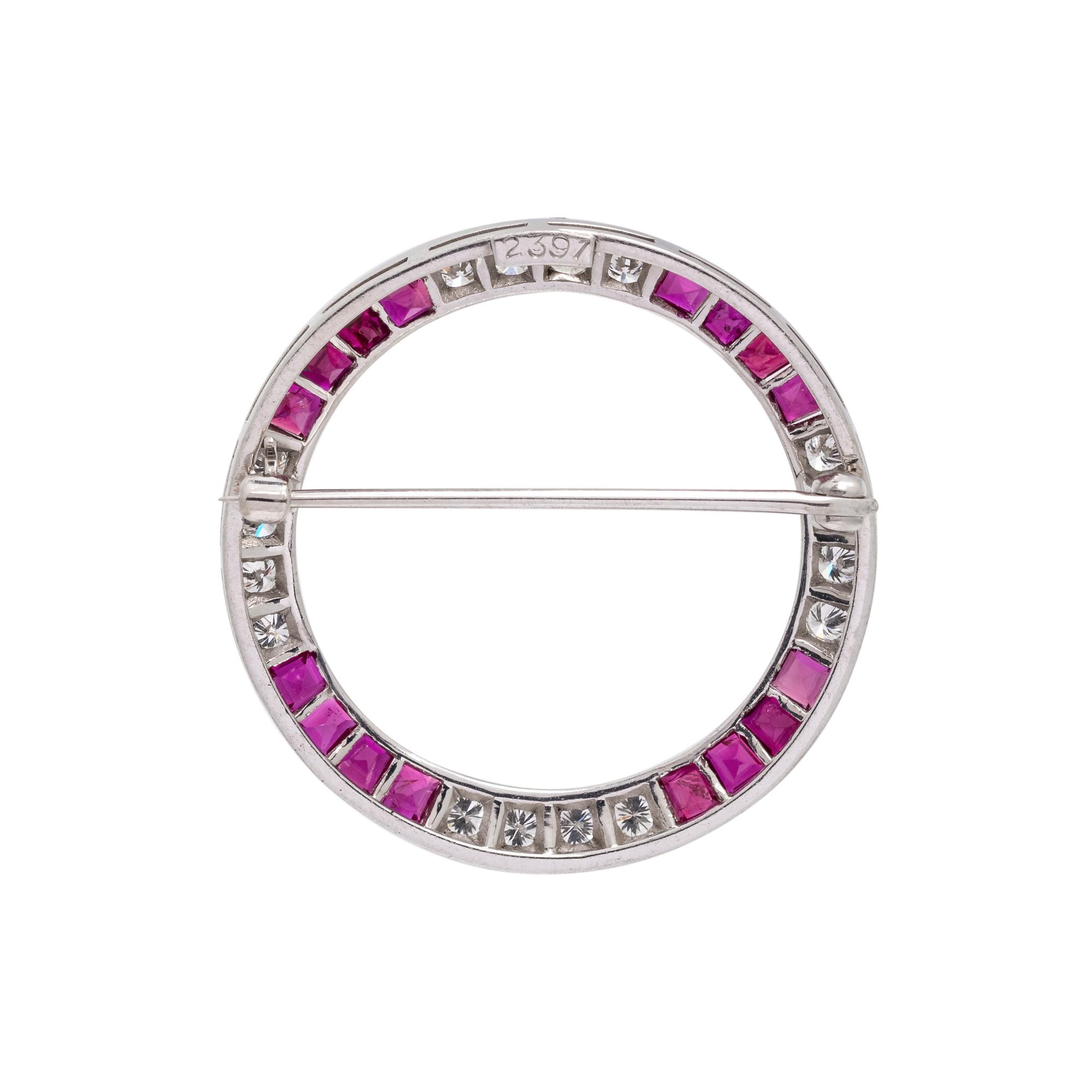 DIAMOND AND RUBY CIRCLE BROOCH