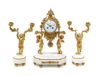 A Louis XVI Gilt Bronze and Marble Three-Piece Clock Garniture