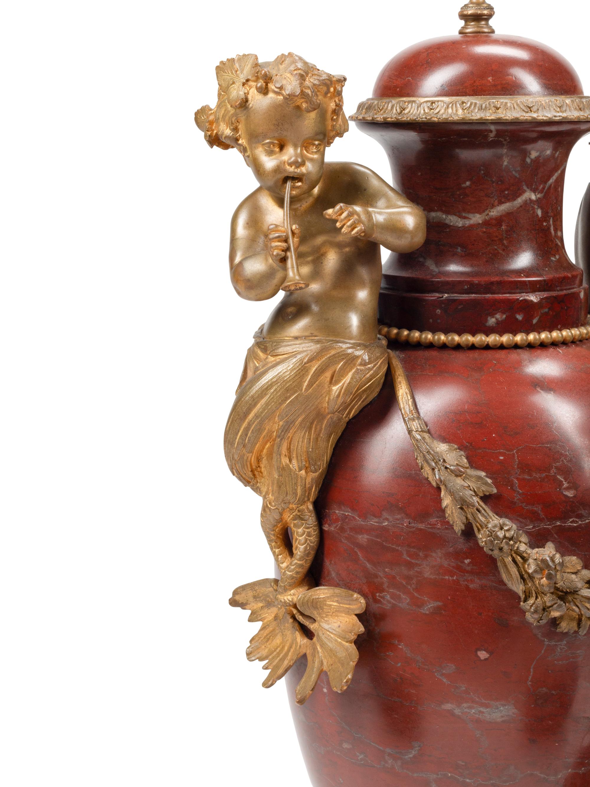 A Pair of Napoleon III Gilt Bronze Mounted Rouge Griotte Marble Urns