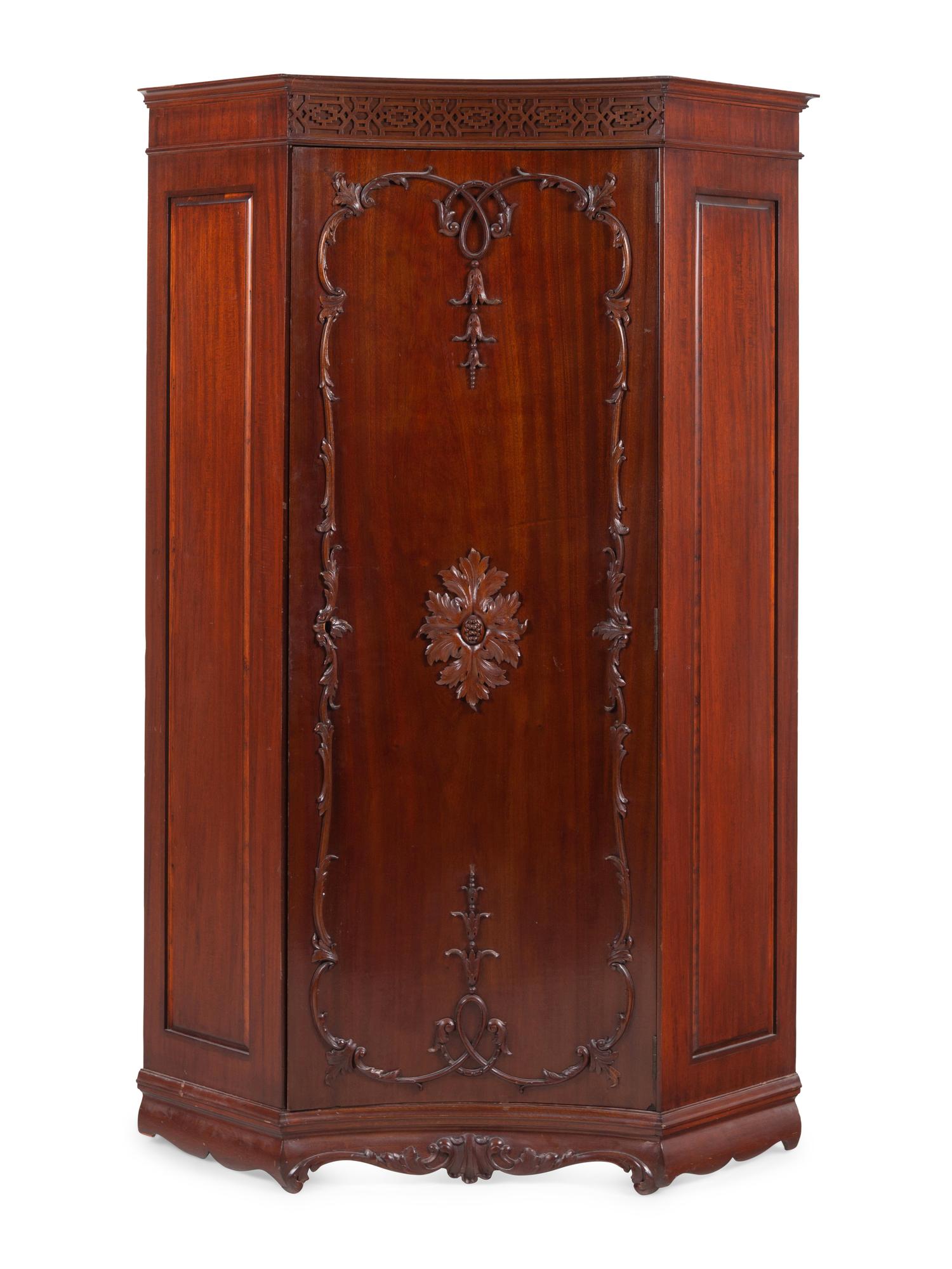 A George III Style Mahogany Corner Cabinet in the Chippendale Taste