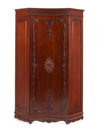 A George III Style Mahogany Corner Cabinet in the Chippendale Taste
