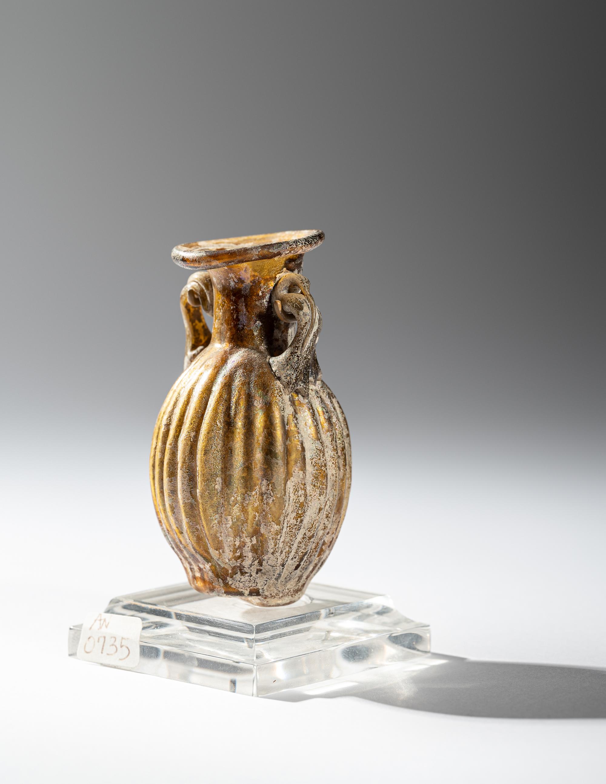 A Sidonian Yellow Glass Flask