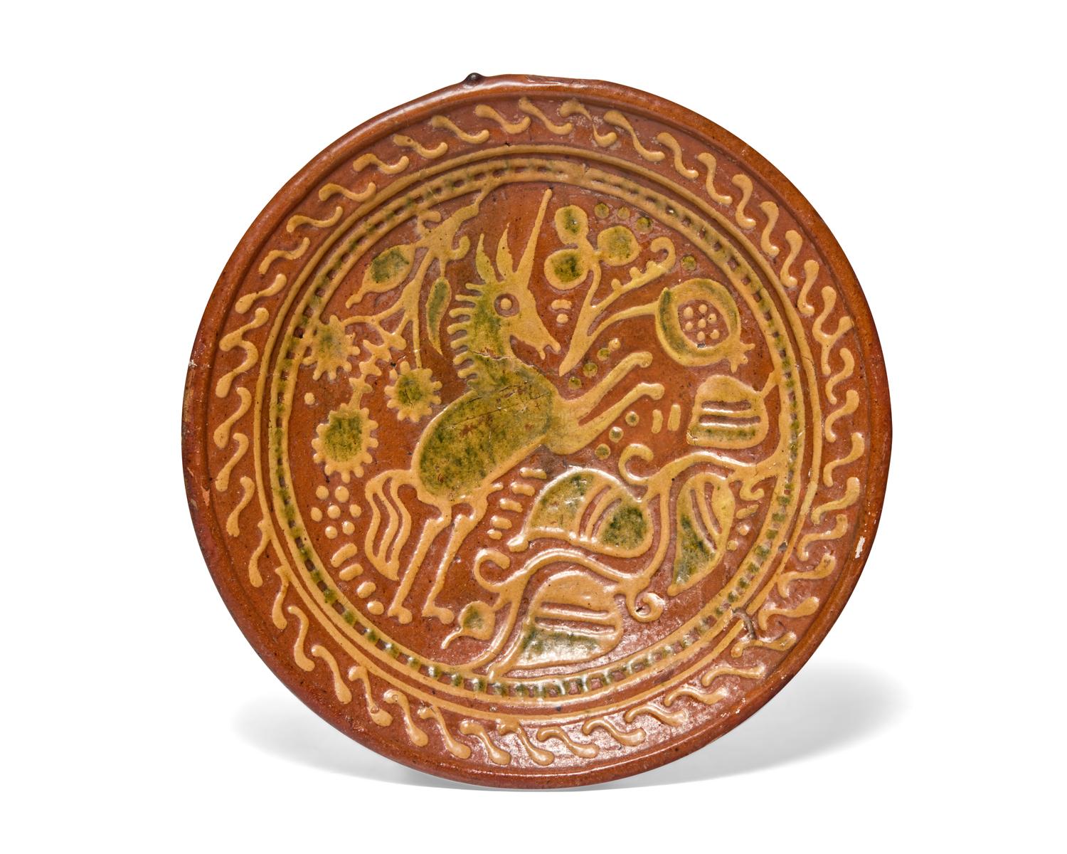 A Dutch Slip-Decorated Earthenware Footed Charger, 17th Century