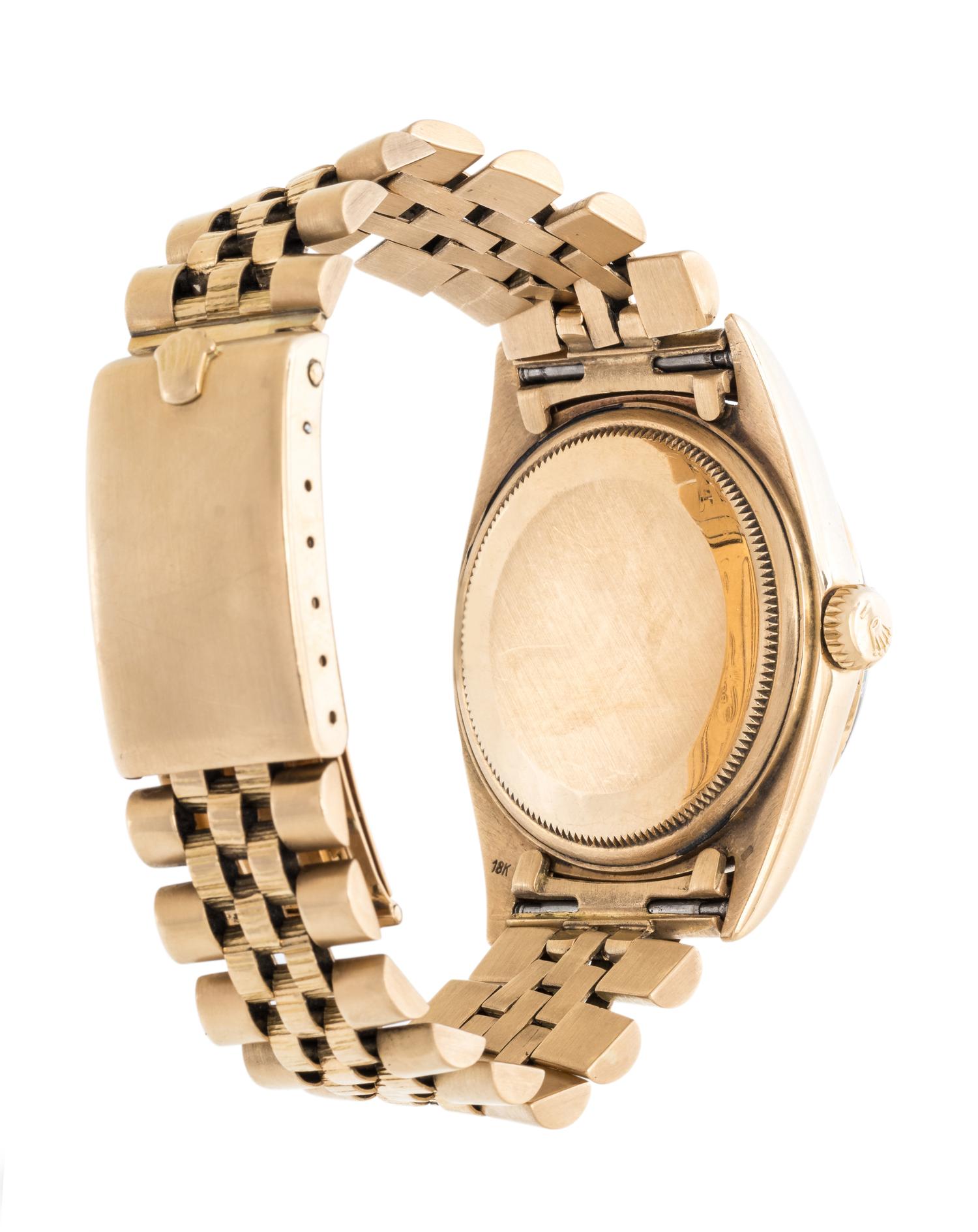 ROLEX, REF. 1807 18K YELLOW GOLD 'OYSTER-PERPETUAL FRENCH DAY DATE' WRISTWATCH, CIRCA 1969