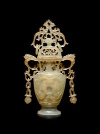 A Carved Serpentine Vase and Cover