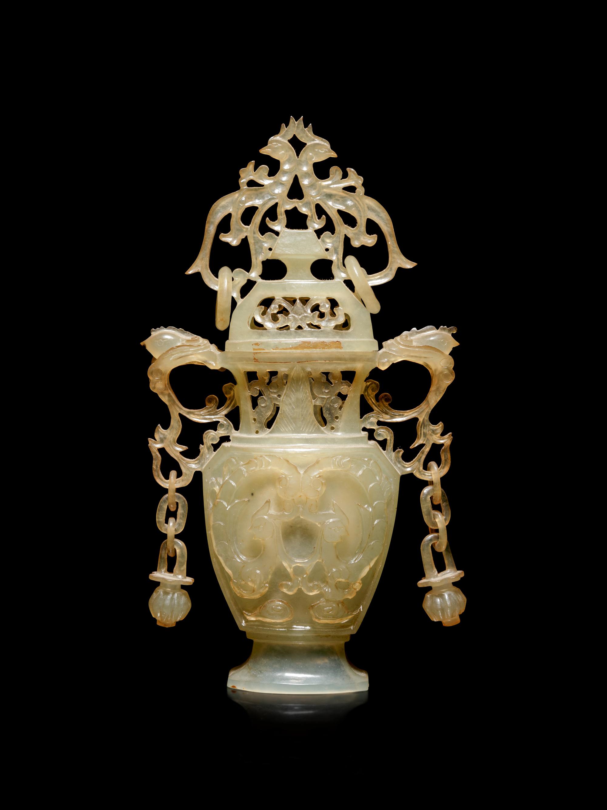 A Carved Serpentine Vase and Cover
