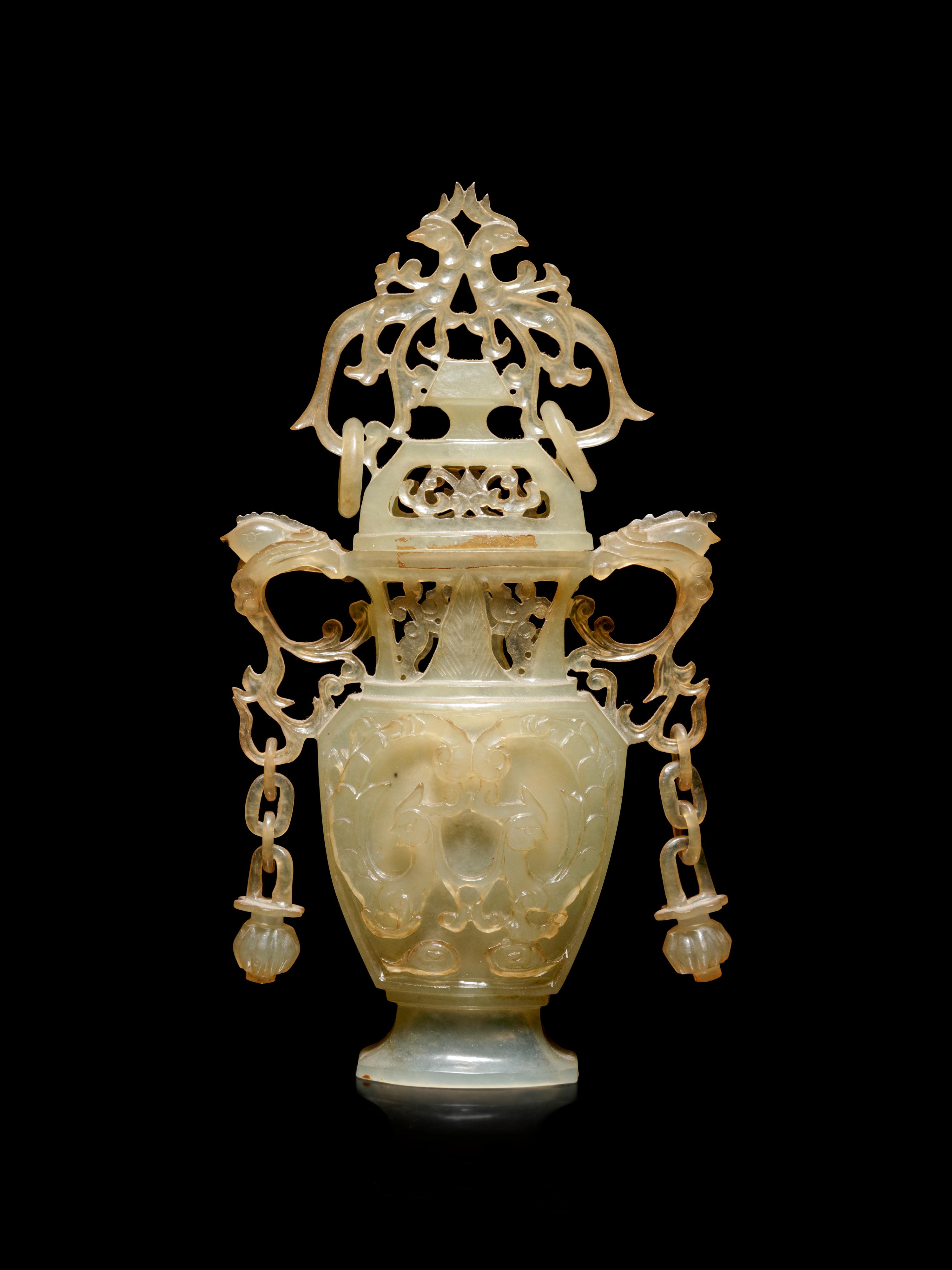 A Carved Serpentine Vase and Cover