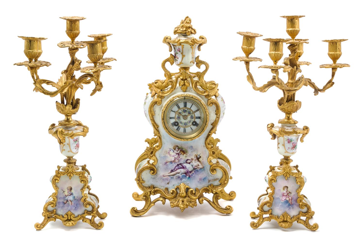 A Louis XV Style Gilt Bronze and Sevres Style Porcelain Clock Garniture Height of candelabra 16 3/4 inches. — LATE 19TH/EARLY 20TH CENTURY