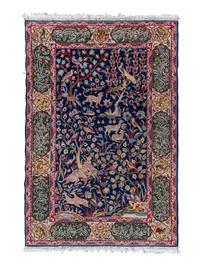 A Tabriz or Qum Wool Rug