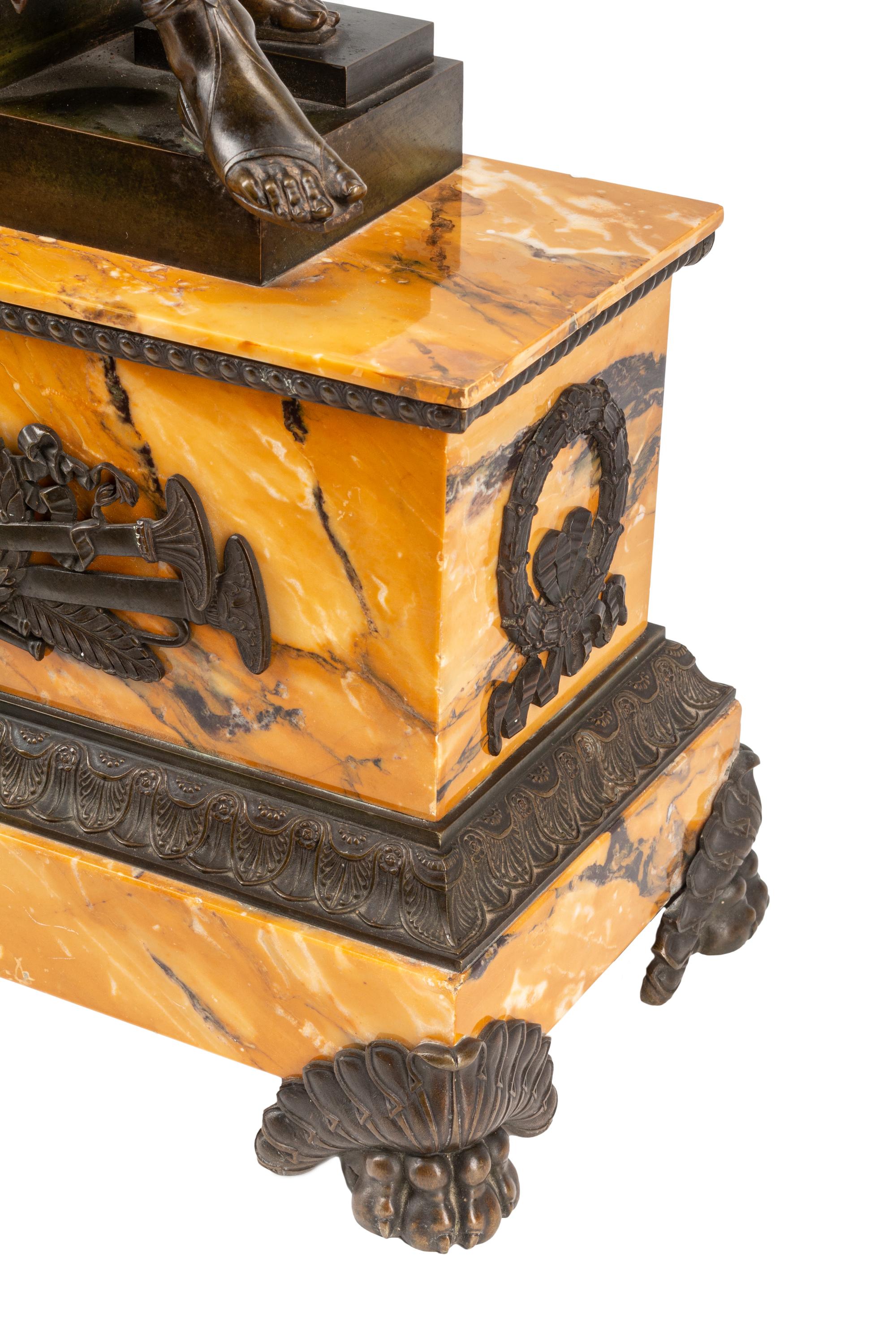 A Louis Philippe Bronze and Marble Figural Clock