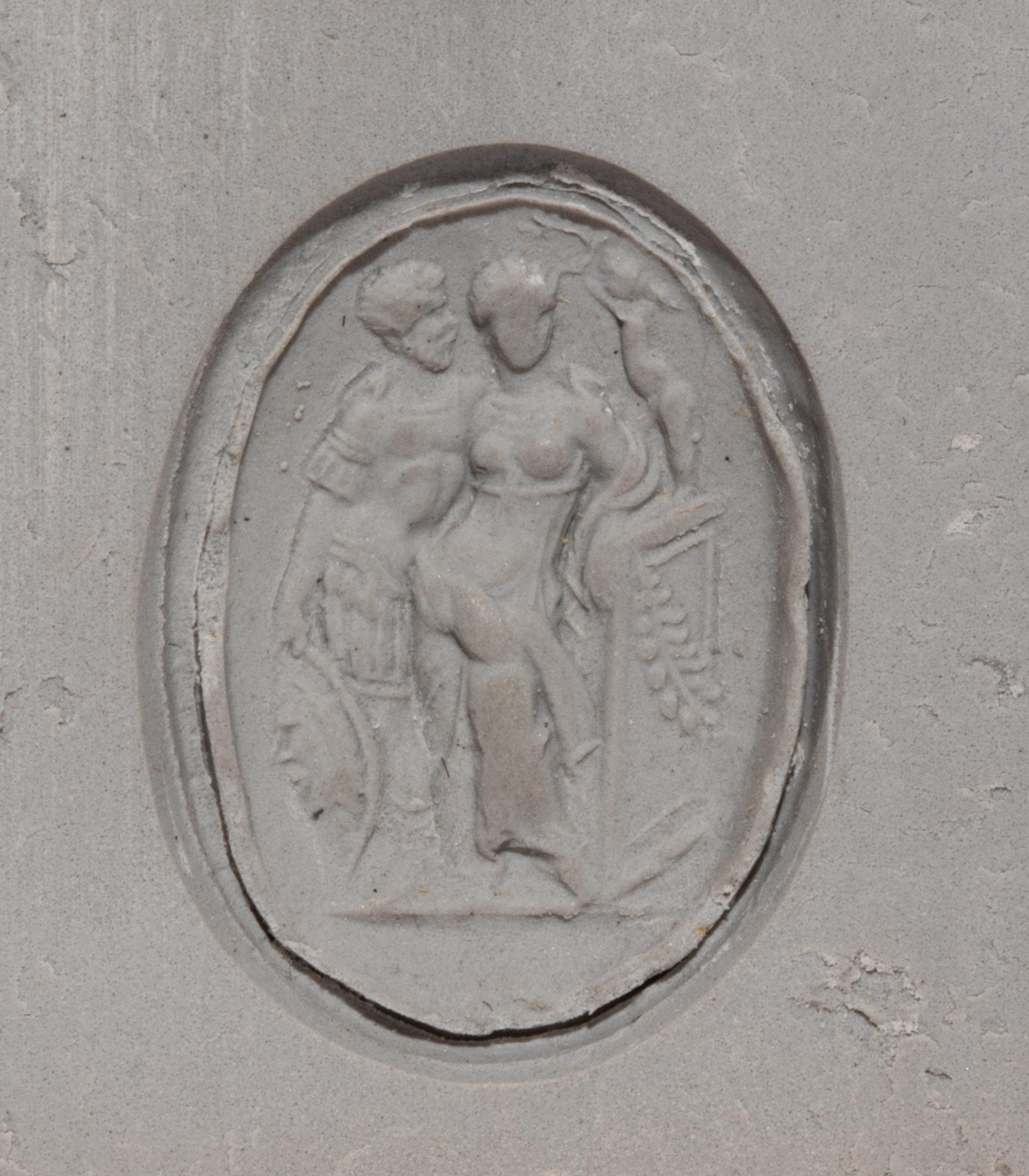 A Neoclassical Gold and Glass Paste Gilt-Seal Fob with Eros Crowing Mars and Venus