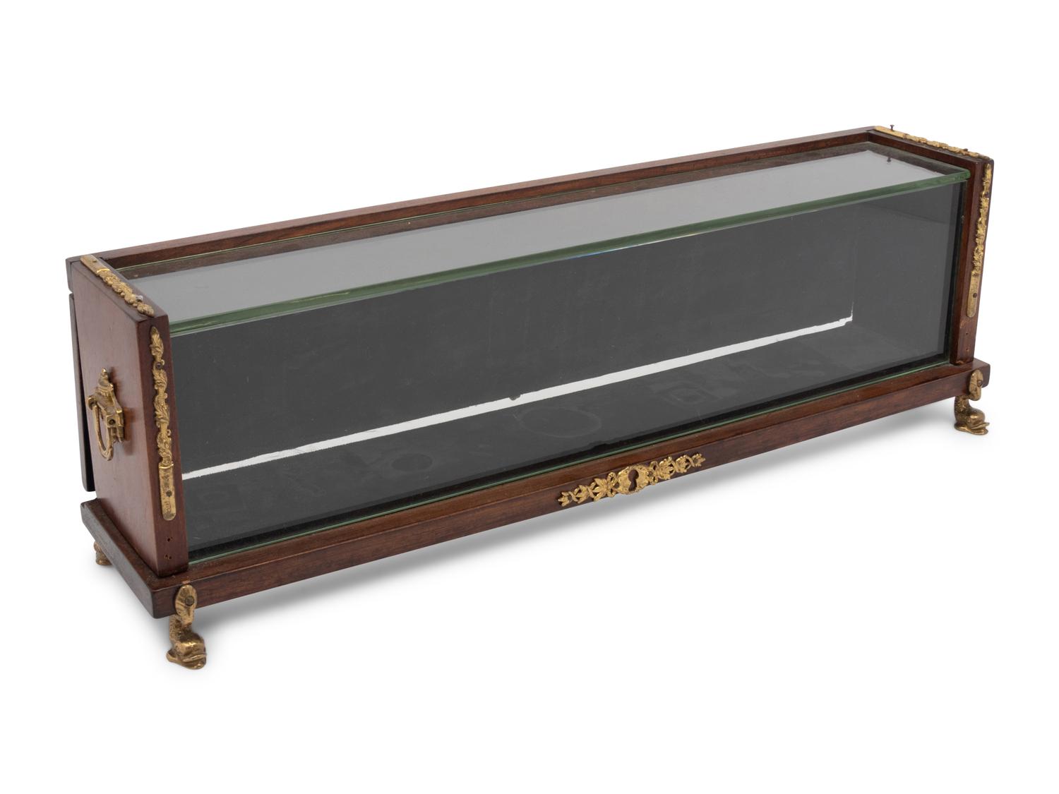 A Continental Gilt Metal Mounted Mahogany Vitrine Case