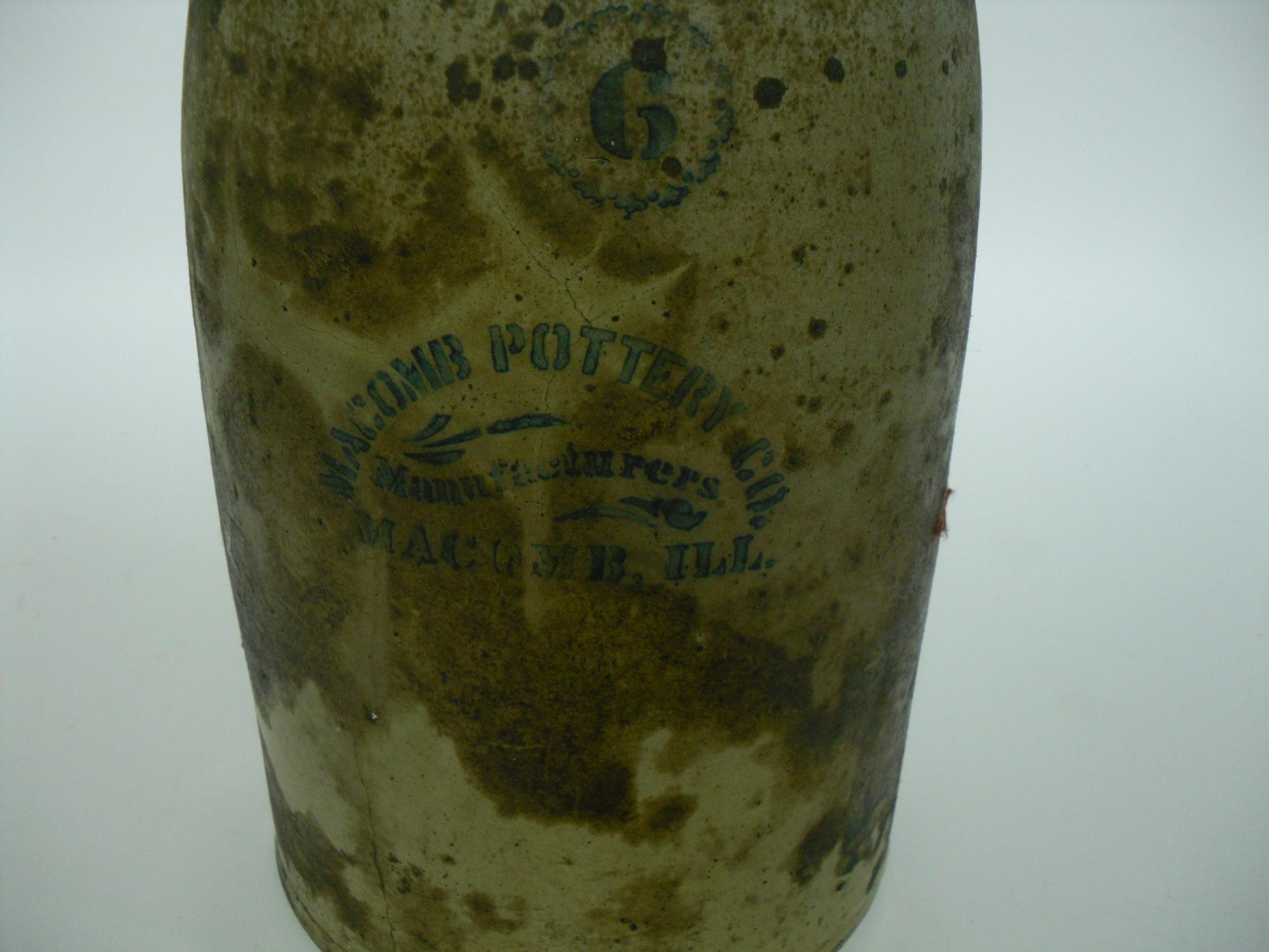 A Group of Seven Pottery Stoneware Articles Height of tallest 18 1/2 inches.