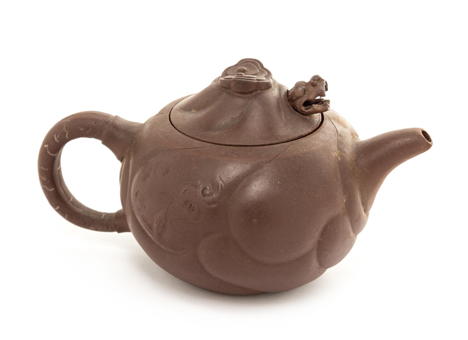 A Chinese Yixing Pottery Teapot