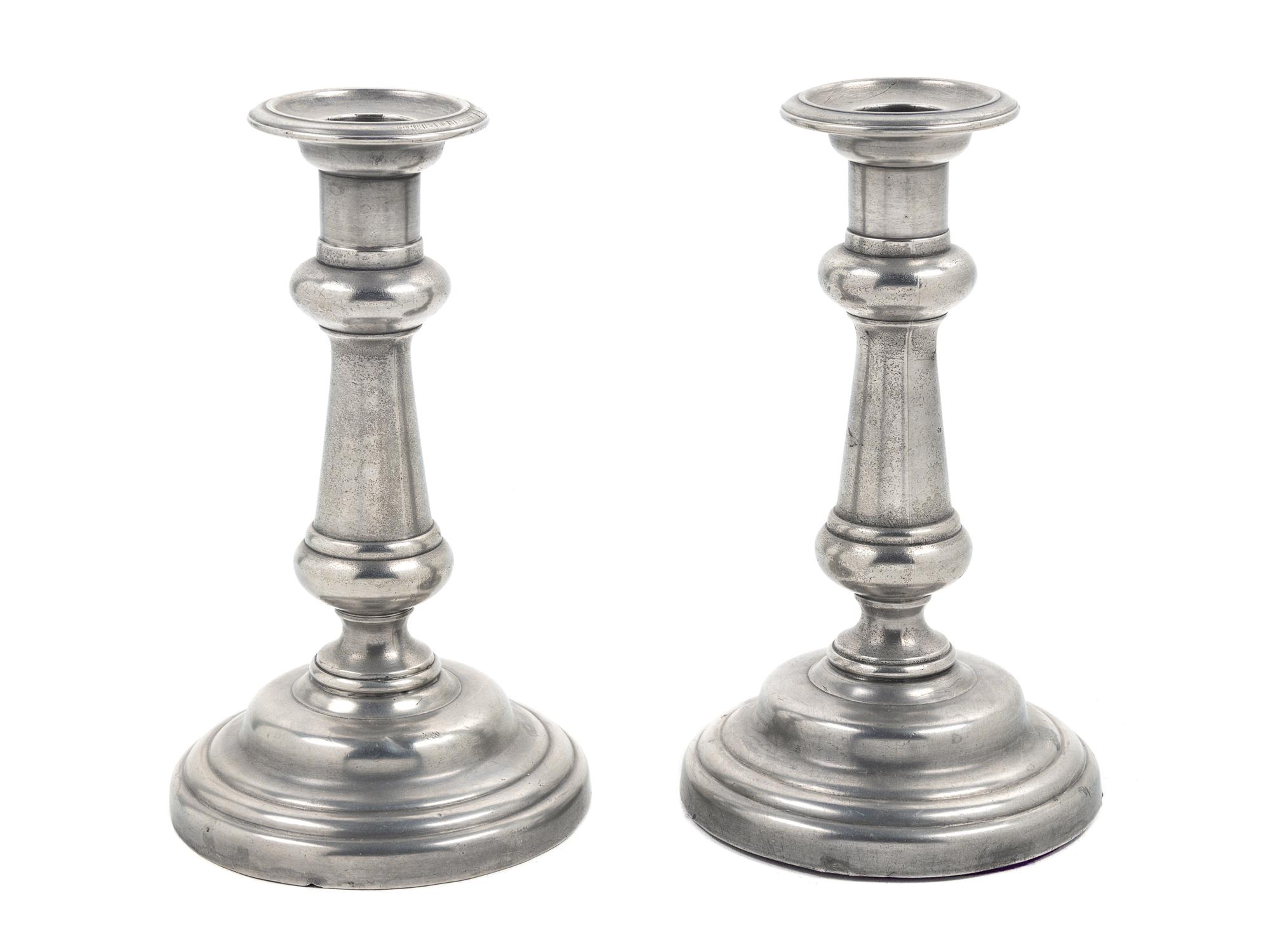A Pair of British Pewter Candlesticks