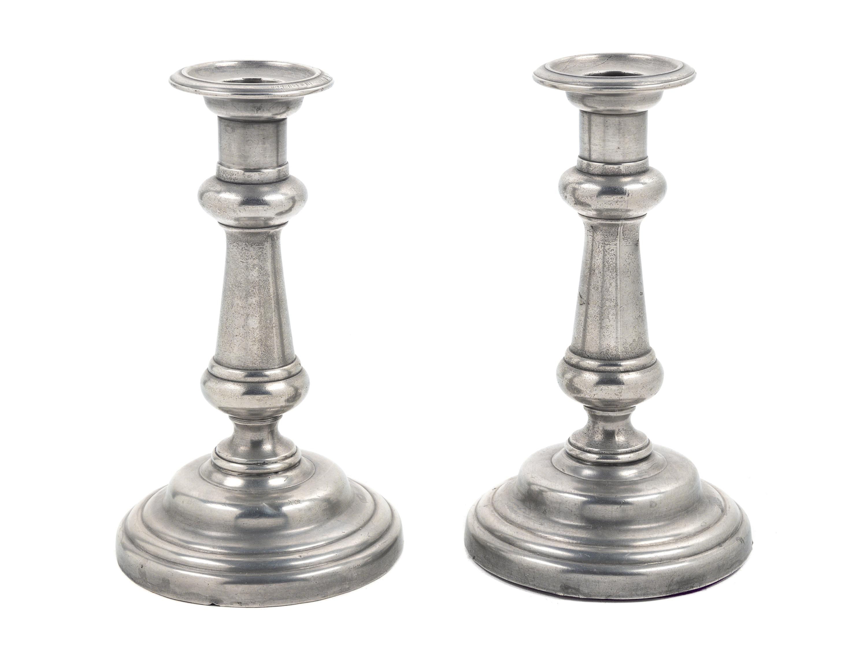 A Pair of British Pewter Candlesticks