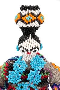 Menagerie of Beaded Zuni Dolls and Animals