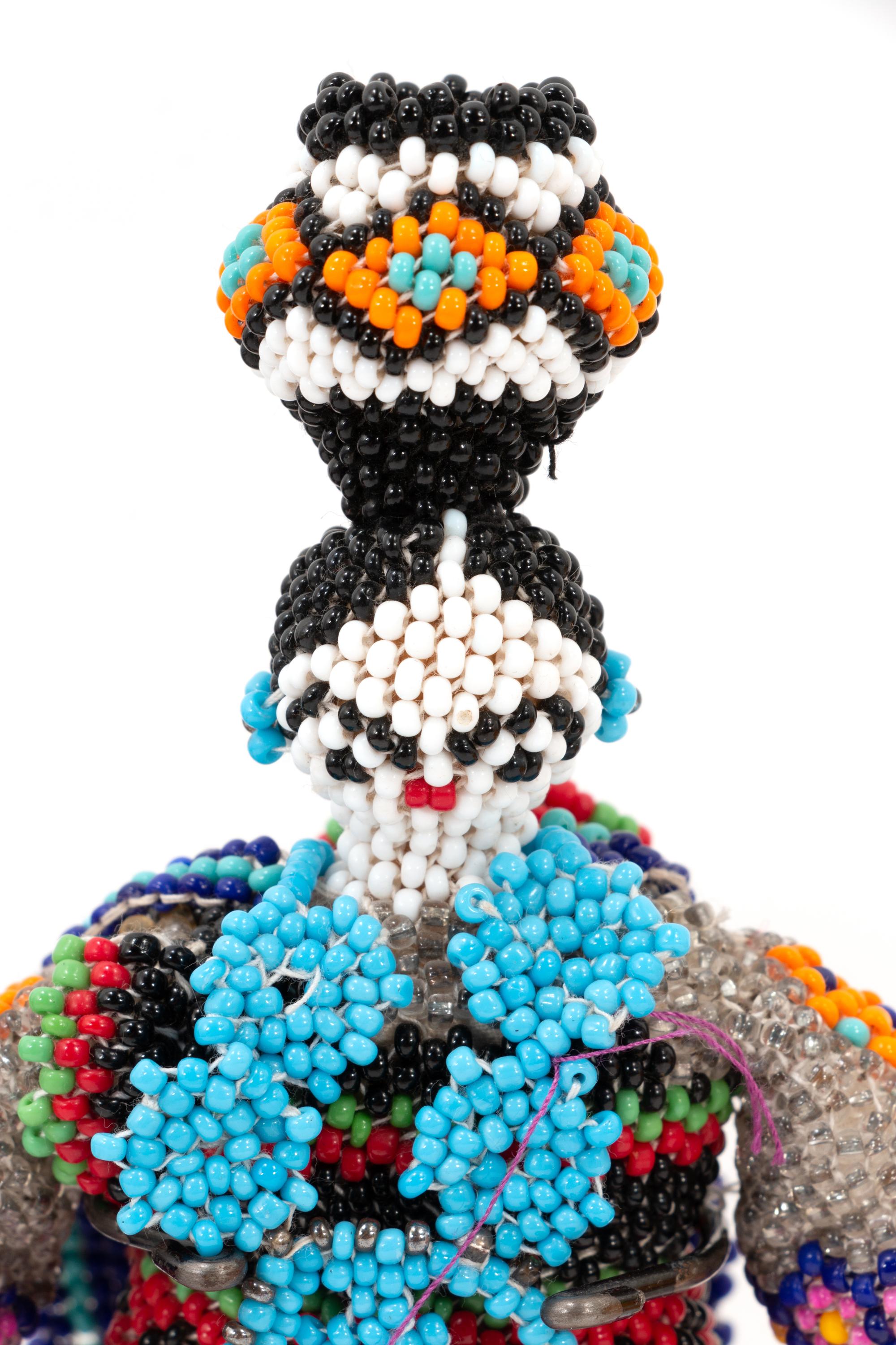 Menagerie of Beaded Zuni Dolls and Animals