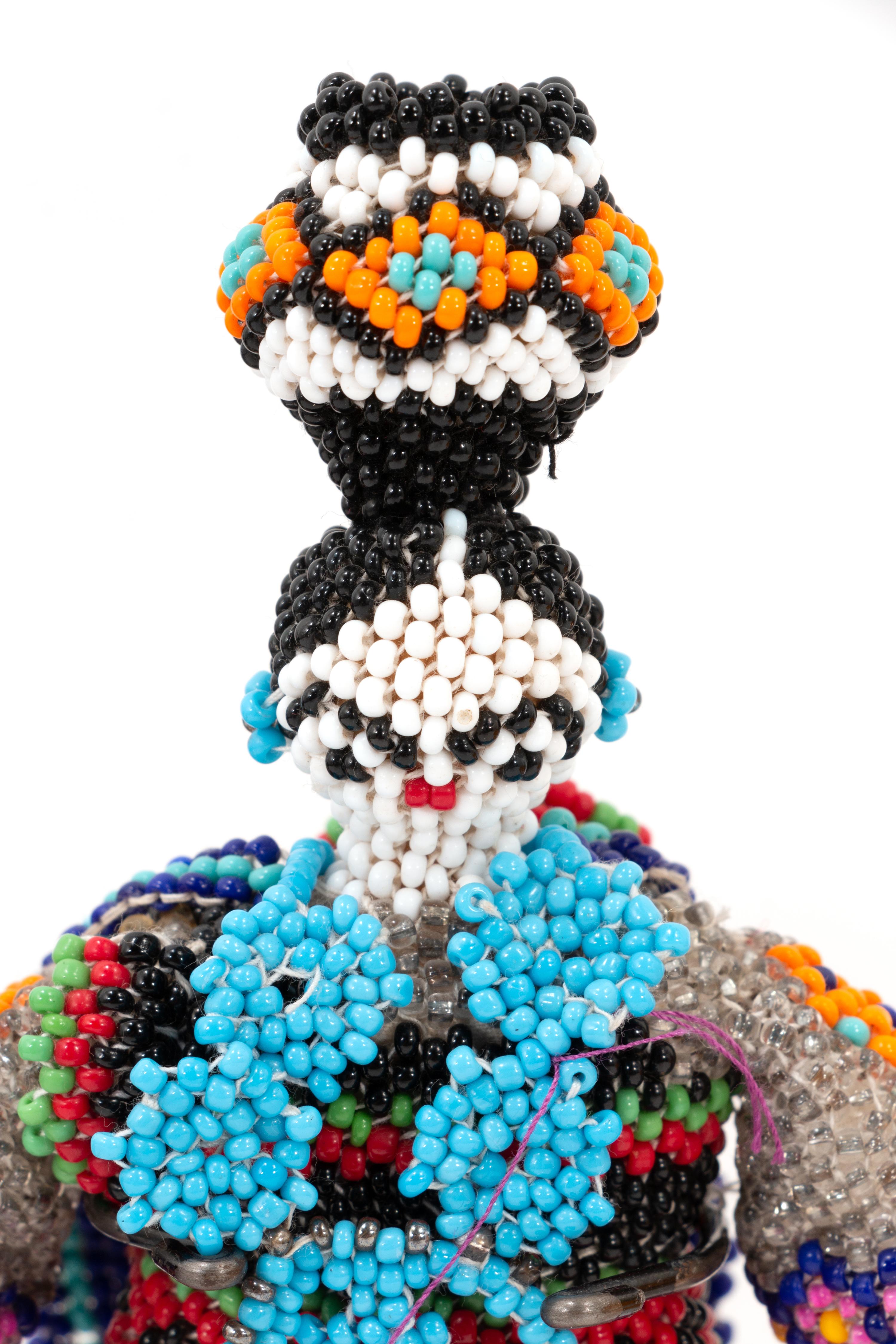 Menagerie of Beaded Zuni Dolls and Animals