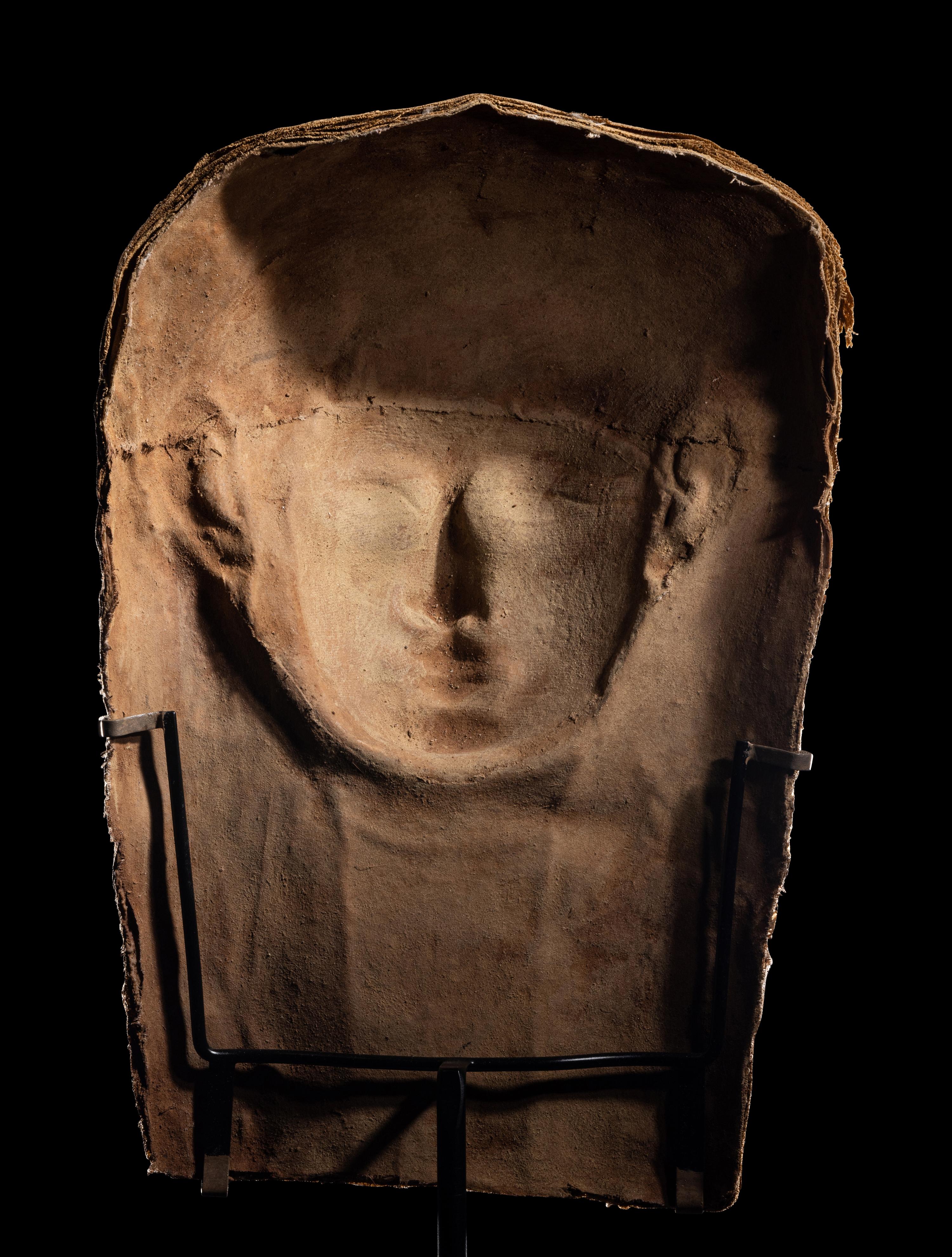 An Egyptian Cartonnage Mummy Mask
