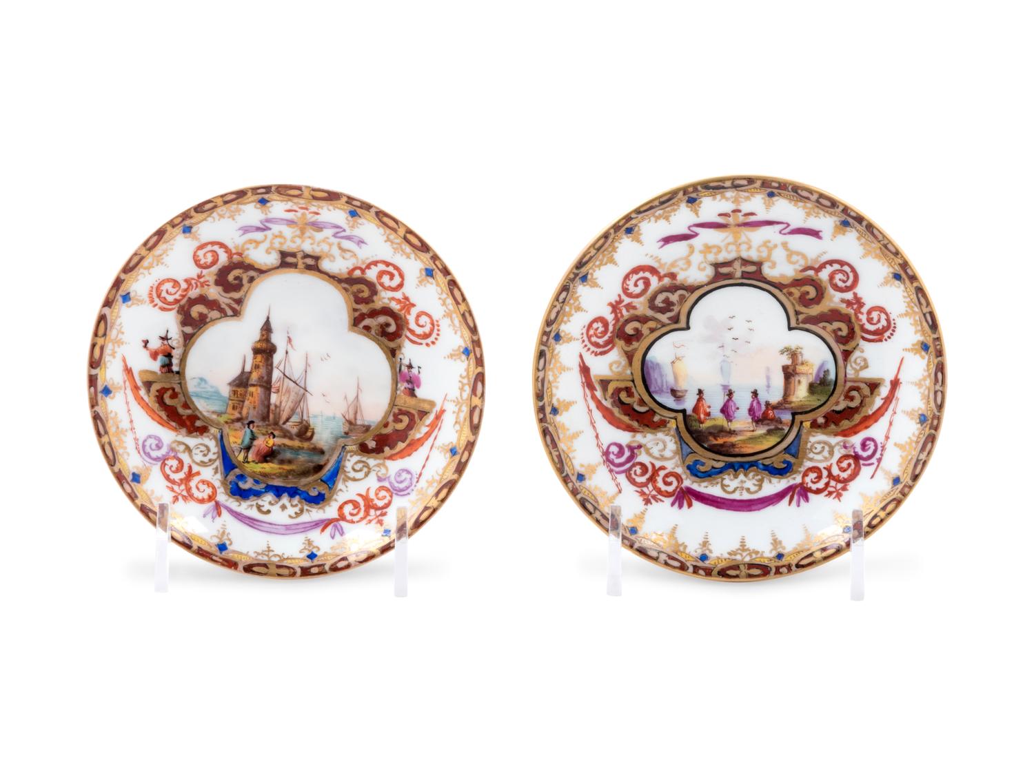 A Pair of Meissen Painted and Parcel Gilt Porcelain Dishes