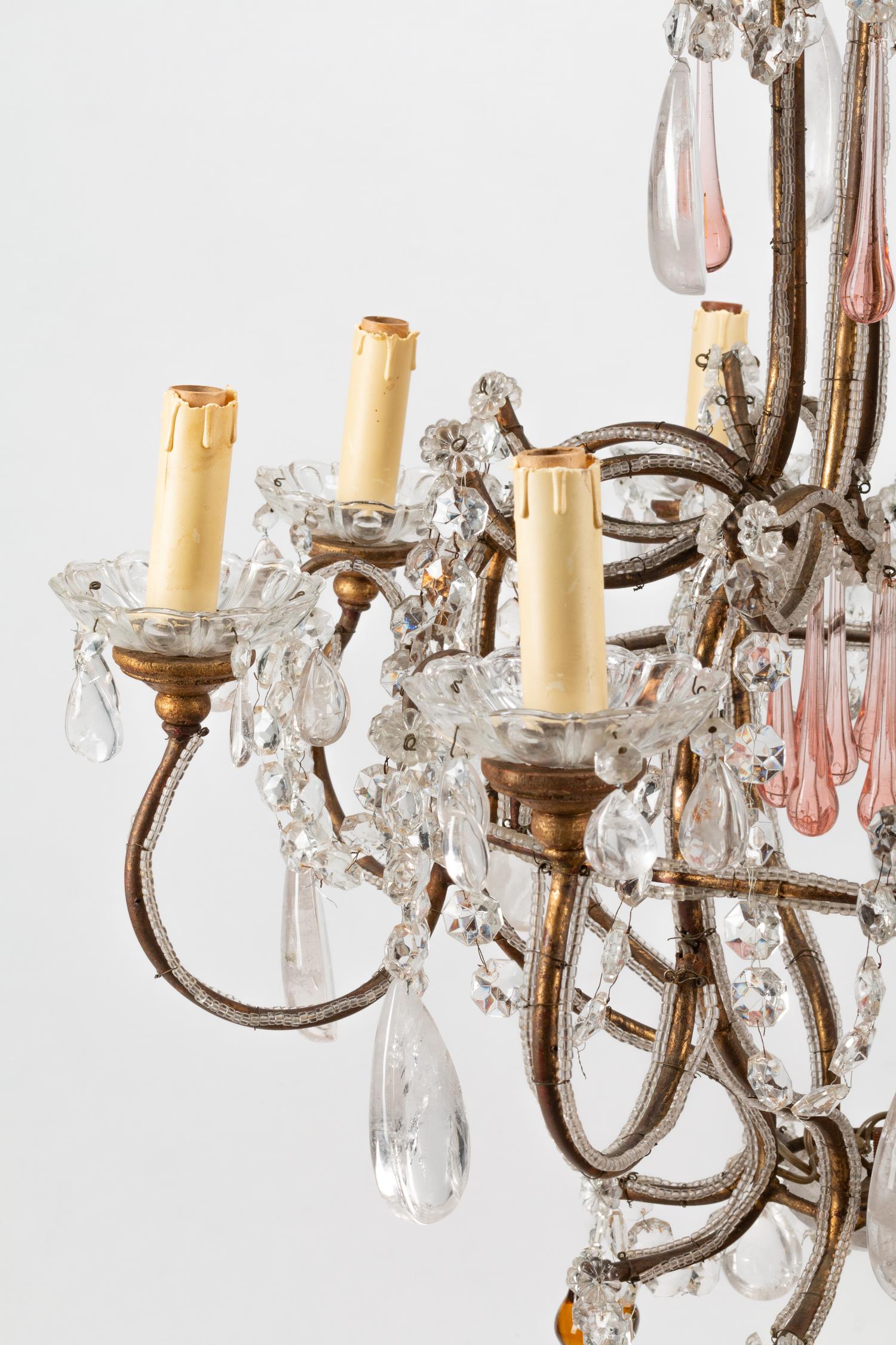 A French Neoclassical Style Eight-Light Chandelier with Glass and Rock Crystal Prisms