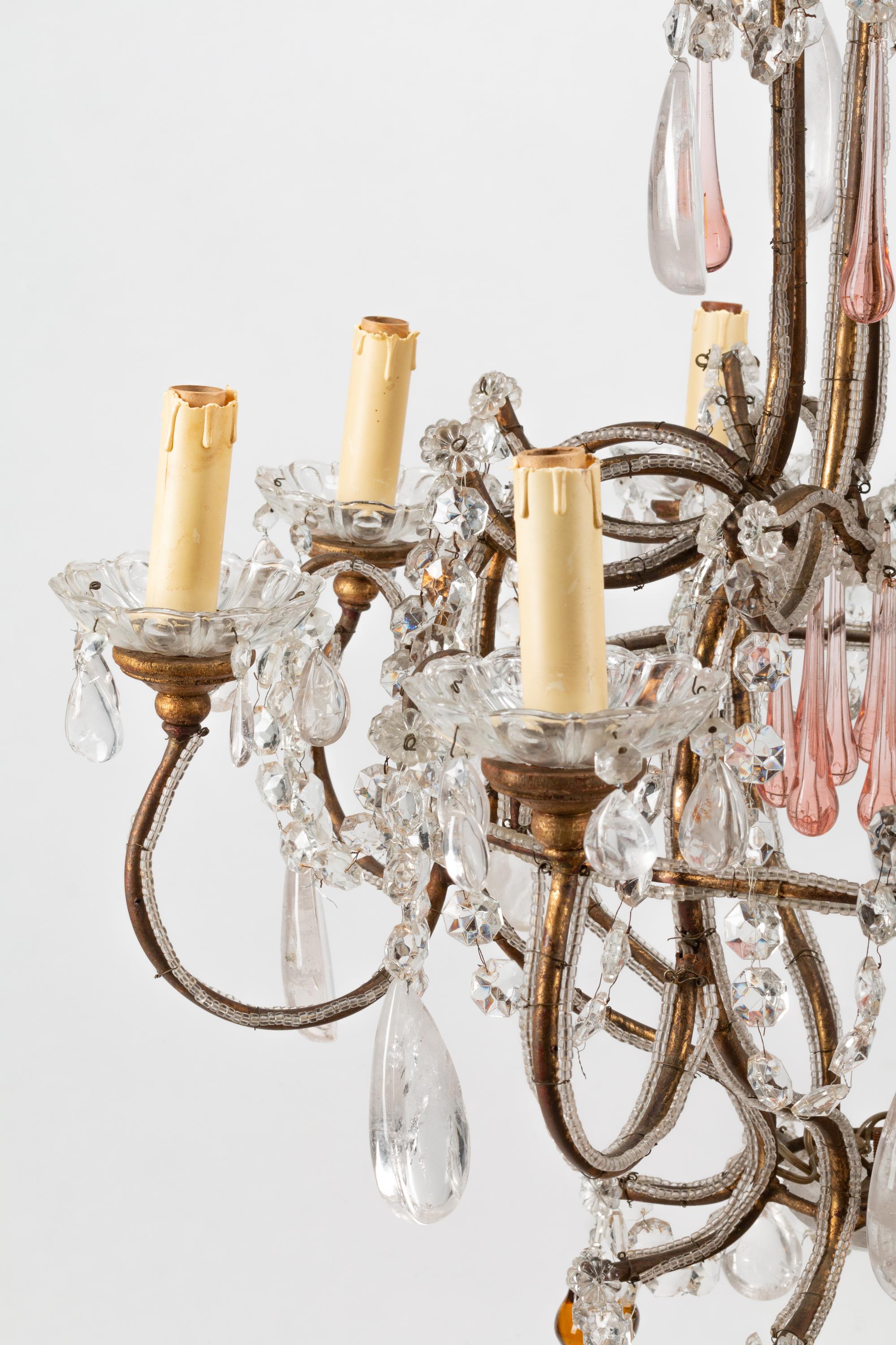A French Neoclassical Style Eight-Light Chandelier with Glass and Rock Crystal Prisms