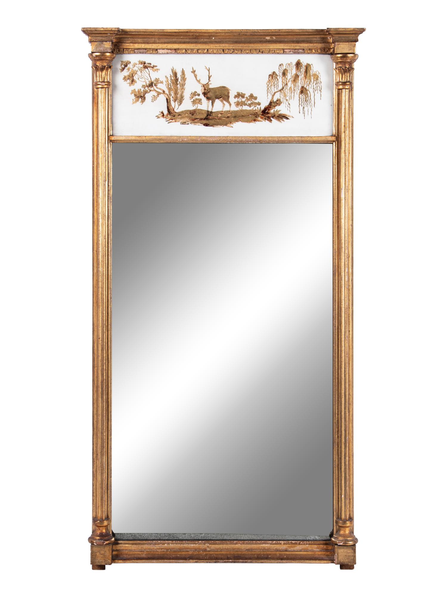 A Classical Giltwood and Eglomise Panel Inset Looking Glass