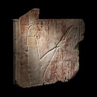 An Egyptian Limestone Relief Fragment