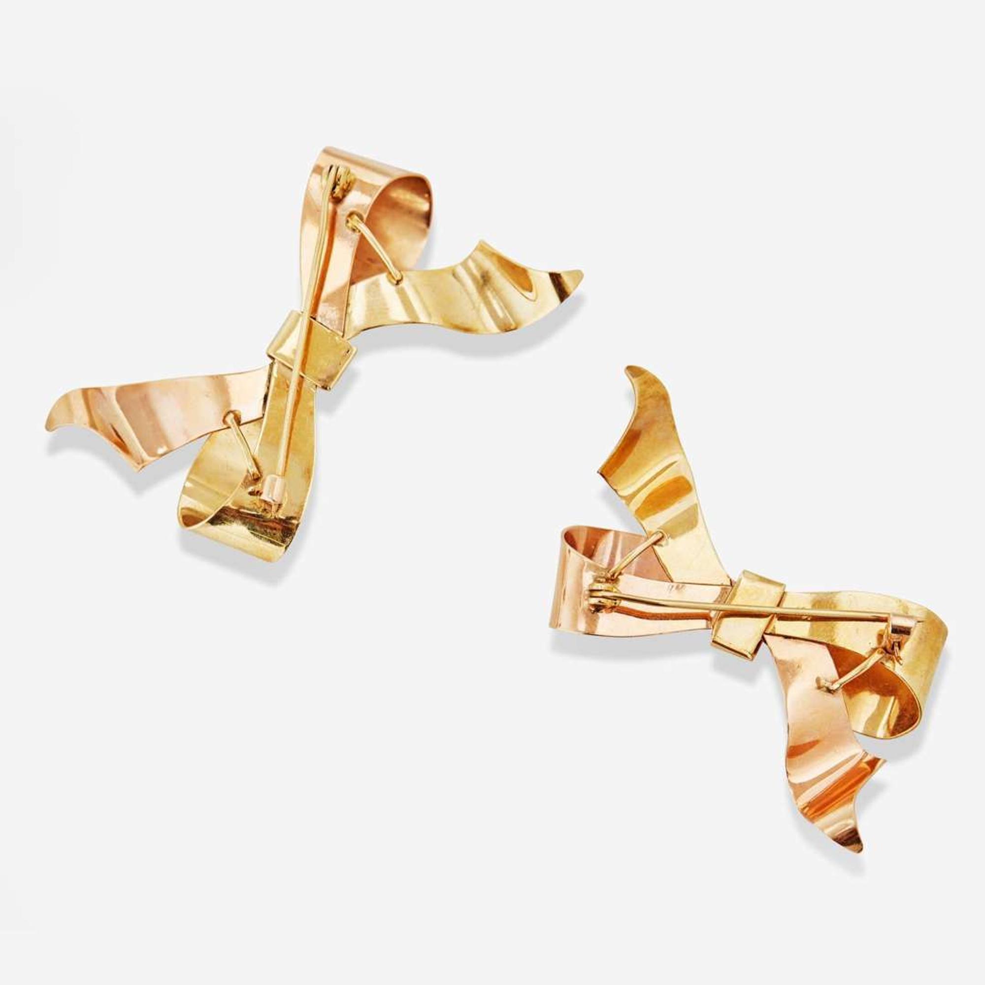 A Set of Two 14K Gold Bow Pins
