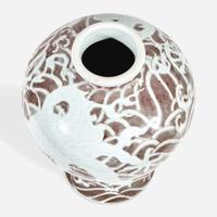A Chinese carved and underglaze red "Dragons and Waves" vase, Meiping Yongzheng six-character mark and of the period