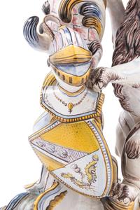 A Pair of French Faience Lion Ornaments